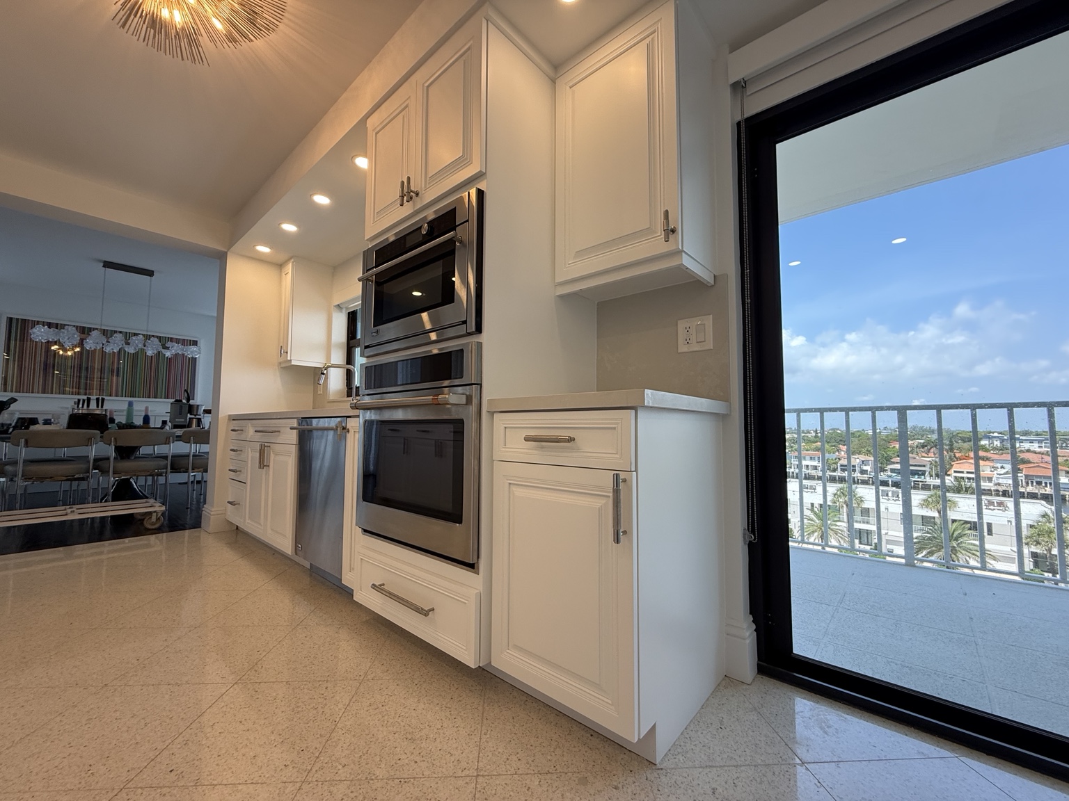 Finished cabinets around ovens