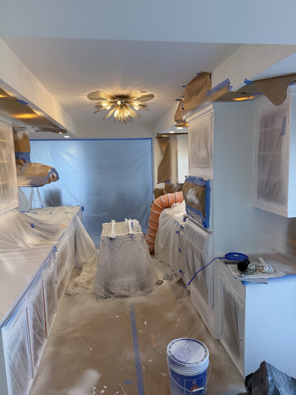 Kitchen protected for cabinet refinishing