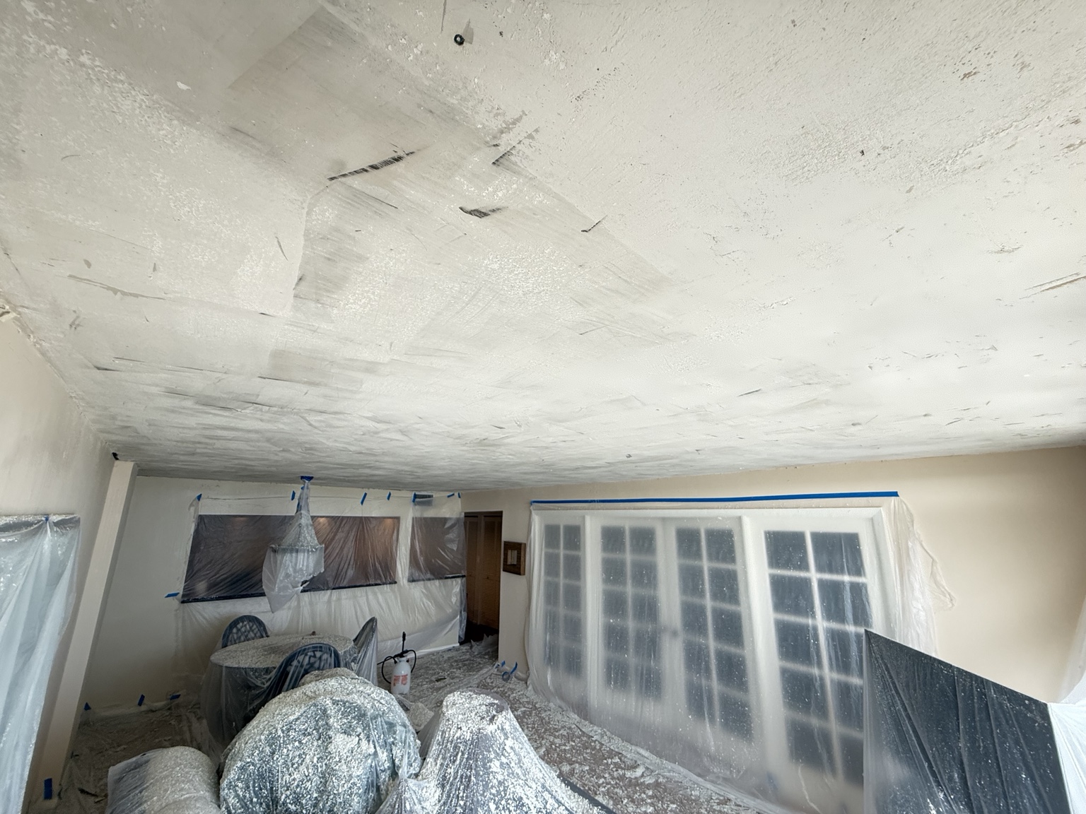 Protected room during popcorn ceiling work